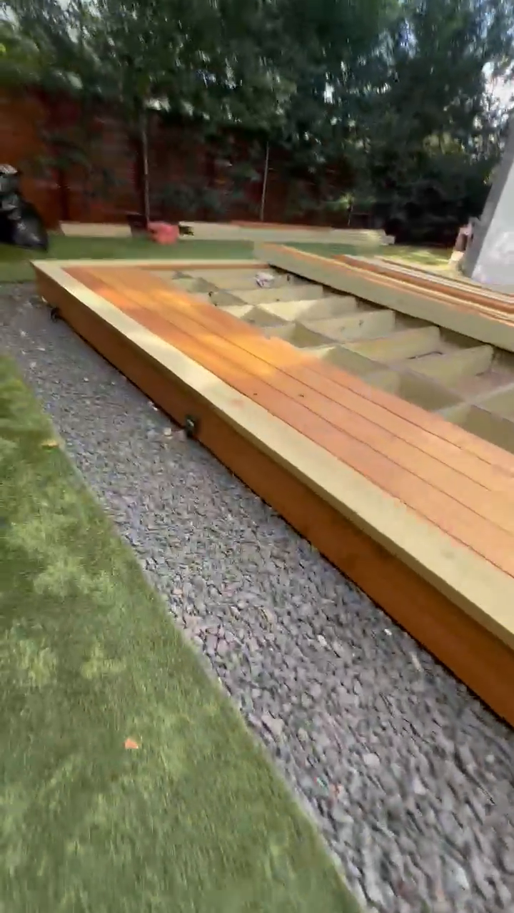 The long diagonal run of decking laid over taped, exposed joist bays